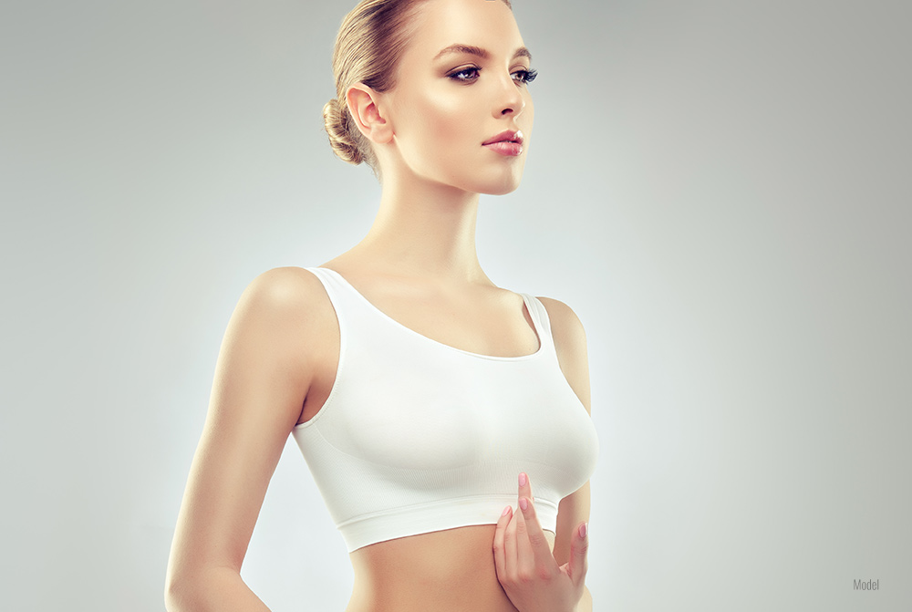 Women in white sport bra