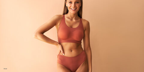 Woman in peach colored underwear